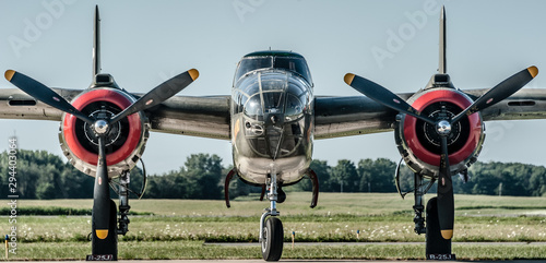 Valokuva WWII B-25 Mitchell Bomber parked on runway head on view
