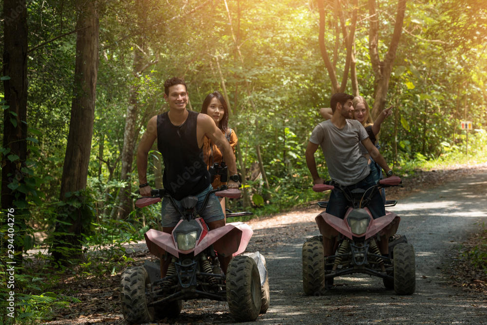 young group on ATV. in the park young group on ATV. in the park