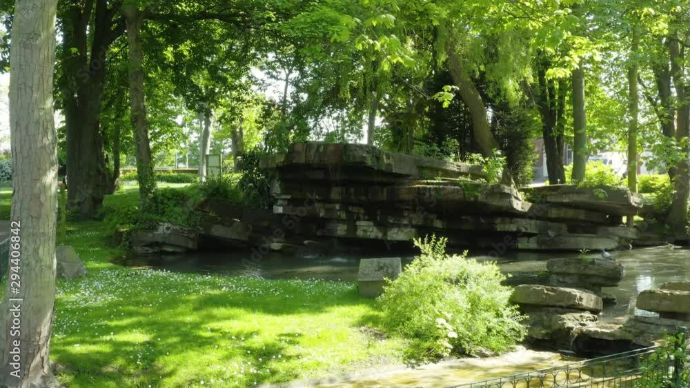 Little cascade in a park (Château Coquelle, France) Little cascade in a park (Château Coquelle, France)