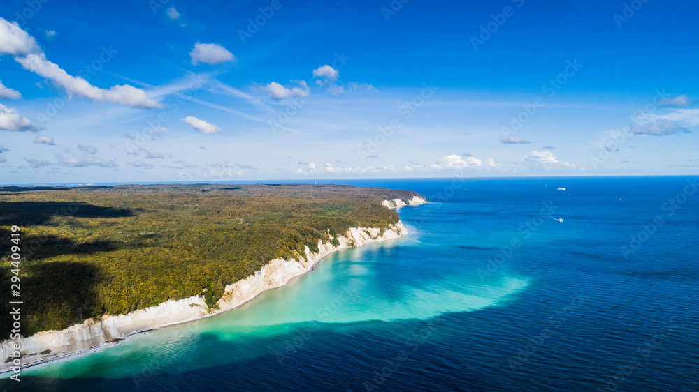 The Chalk Cliffs of Rugen Island, Huge Boulders in the Baltic Sea, Jasmund National Park, Rugen Island, Rügen The Chalk Cliffs of Rugen Island, Huge Boulders in the Baltic Sea, Jasmund National Park, Rugen Island, Rügen