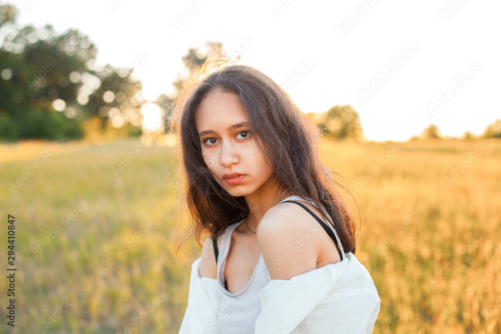 Portrait of adorable young woman on the field Portrait of adorable young woman on the field
