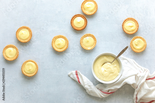 Tableau sur toile Tartlets filled with plain homemade custard