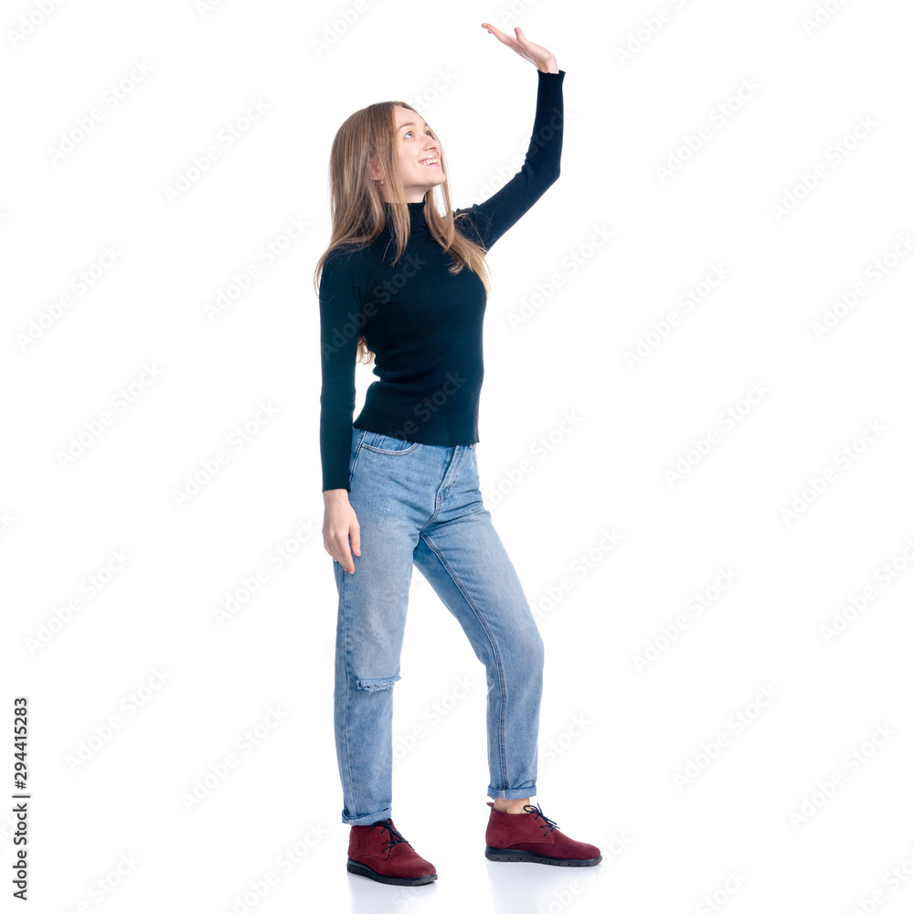 Woman in jeans and sweater waving smiling on white background isolation Woman in jeans and sweater waving smiling on white background isolation