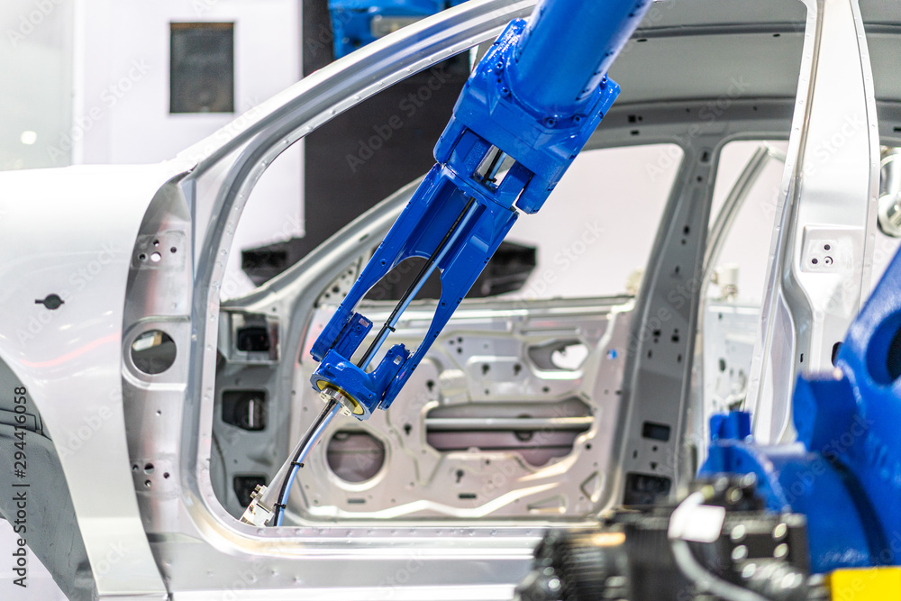 robot arm in factory robot arm in factory