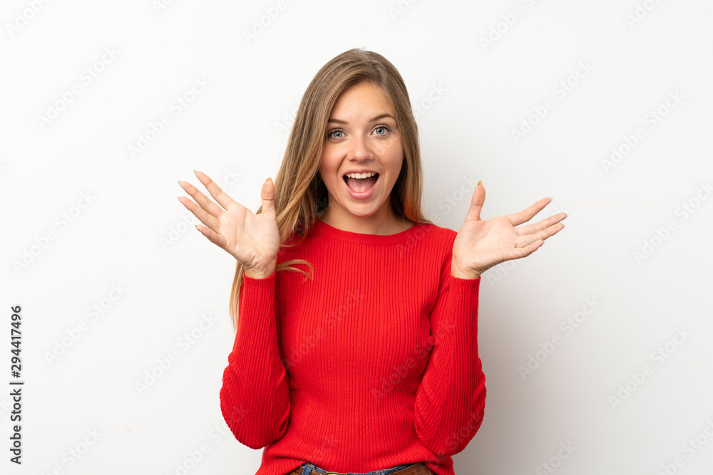 Young blonde woman with red sweater over isolated white background unhappy and frustrated with something Young blonde woman with red sweater over isolated white background unhappy and frustrated with something