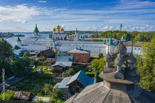 Aerial view of old wooden church and Ipatievsky (Hypatian) Monastery in ancient touristic town Kostroma, Russia. photo
