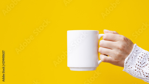Close-up woman with mug and copy-space