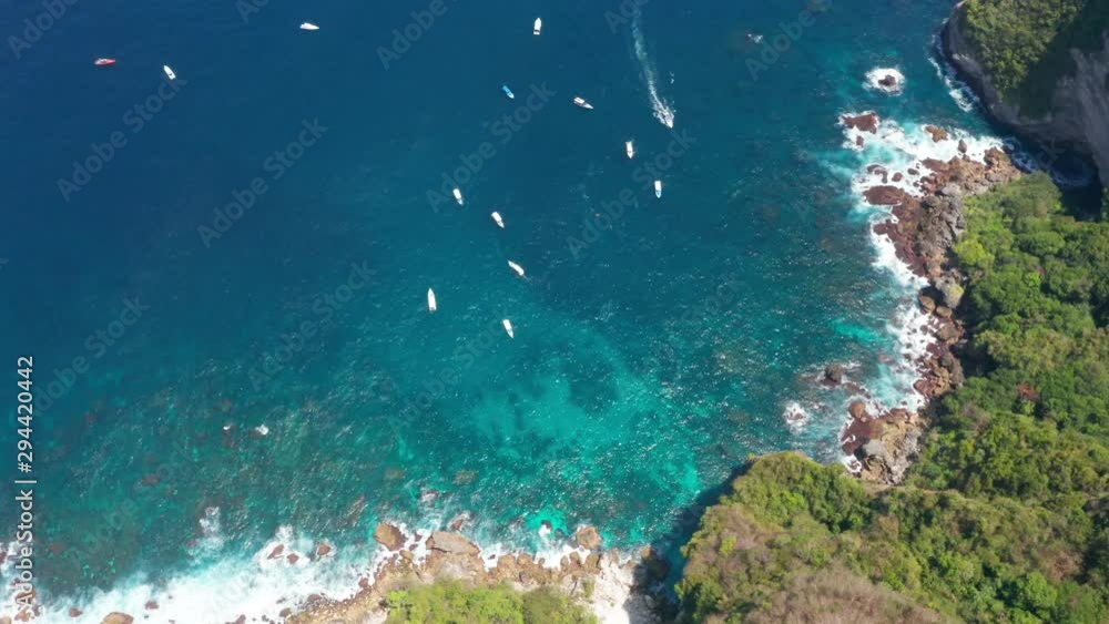 aerial view of gathered boats in islands of bali, parallax shot aerial view of gathered boats in islands of bali, parallax shot