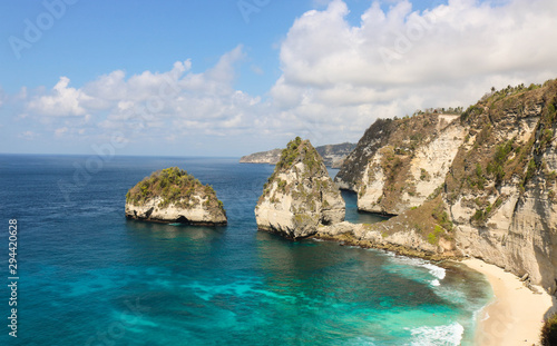 Panorama view of diamond beach in Nusa Penida Island. Bali, Indonesia. Landscape view of diamond beach with rocky and turquoise sea. diamond beach is tourist attraction. Travel concept