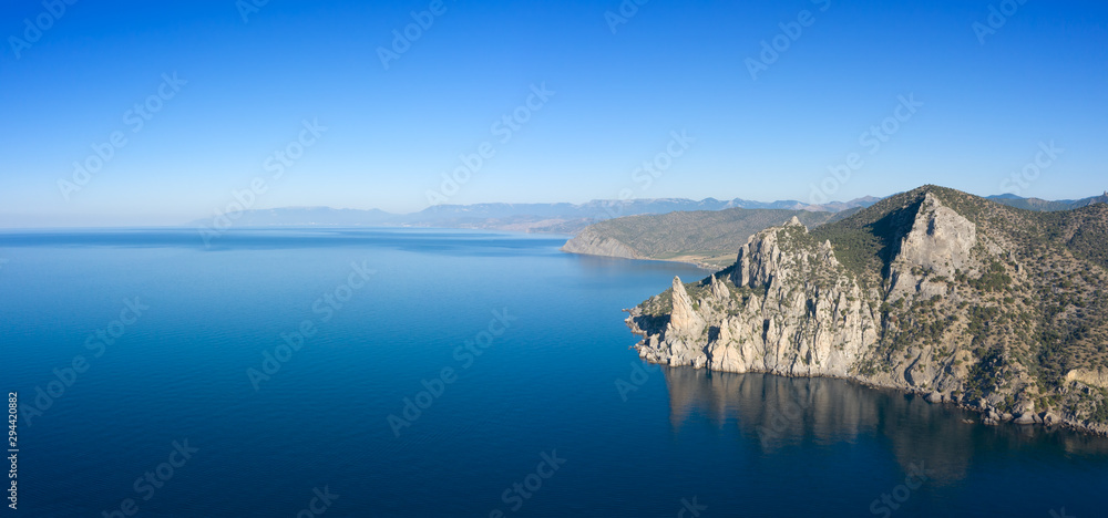 Aerial view of beautiful mountain rocks and sea landscape in Crimea
