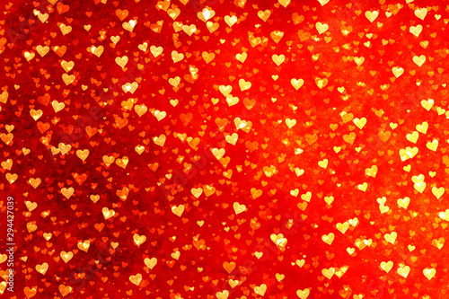 Beautiful confetti hearts falling. Valentine's Day abstract red background with hearts