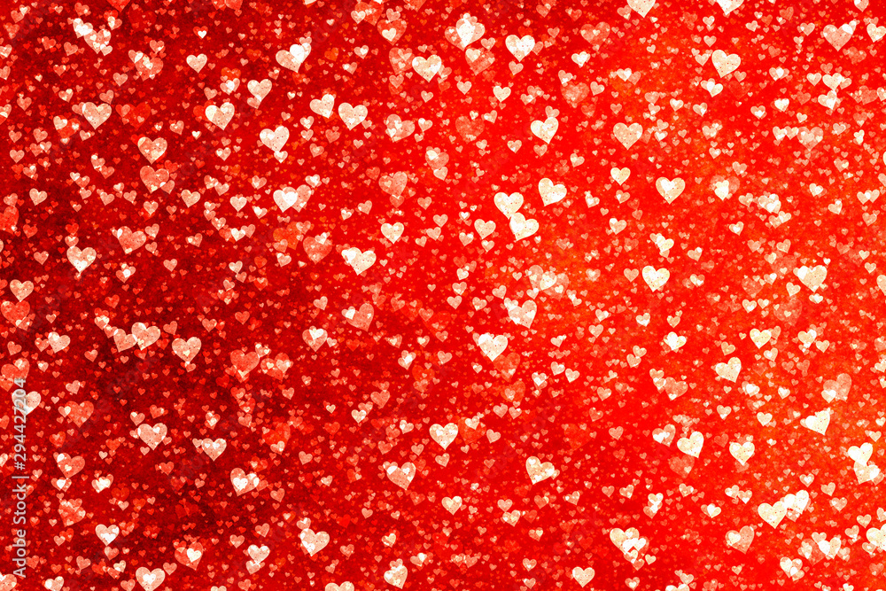 Beautiful confetti hearts falling. Valentine's Day abstract red background with hearts Beautiful confetti hearts falling. Valentine's Day abstract red background with hearts