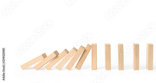 Photography Hand stopping the Domino effect stopped by unique