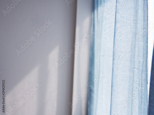 curtain on windows and soft light shine