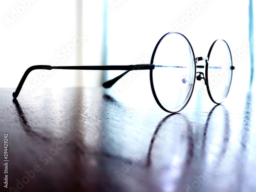glasses on table and soft light from windows 