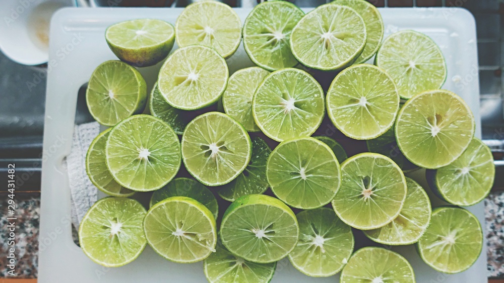 Lime Background. Close up shot of limes. Selective Focus of sliced lime. Lime Background. Close up shot of limes. Selective Focus of sliced lime.