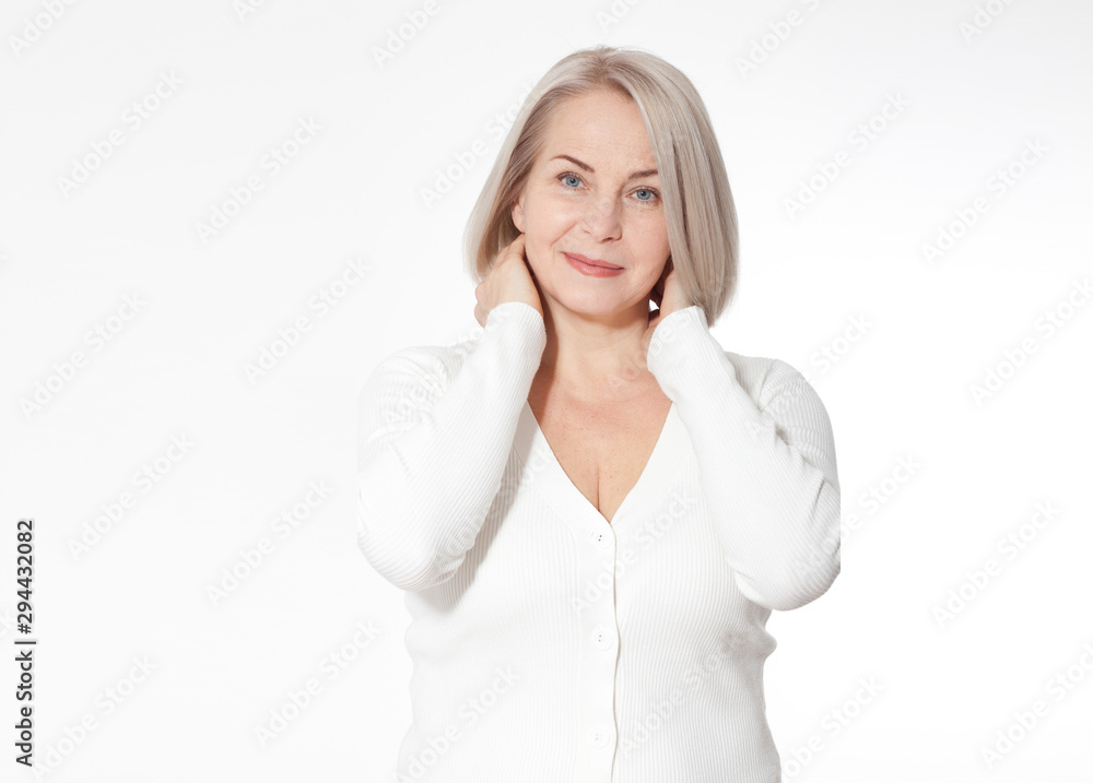 Happy woman emotionally posing in a studio. Happy woman in yellow bright sweater on white background Happy woman emotionally posing in a studio. Happy woman in yellow bright sweater on white background