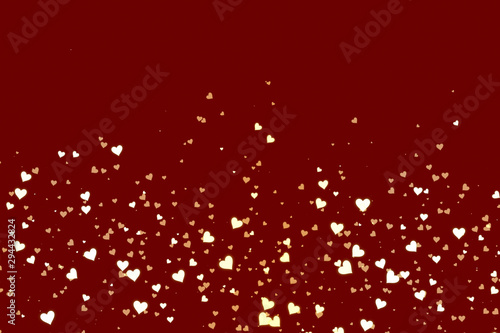 Beautiful confetti hearts falling. Valentine's Day abstract red background with hearts © Niko Bellic