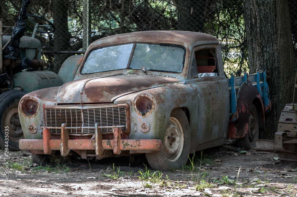 Stock image of an old, rusted, abandoned car. Stock image of an old, rusted, abandoned car.