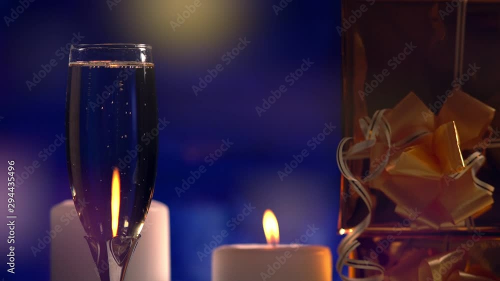 Elegant flute of champagne with candlelight Elegant flute of champagne with candlelight