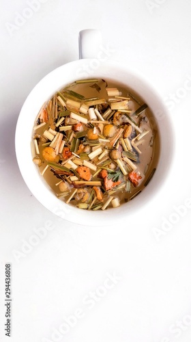 chamomile tea isolated background herbs in a cup