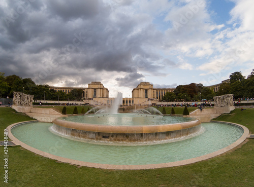 Fountain and cloudy sky