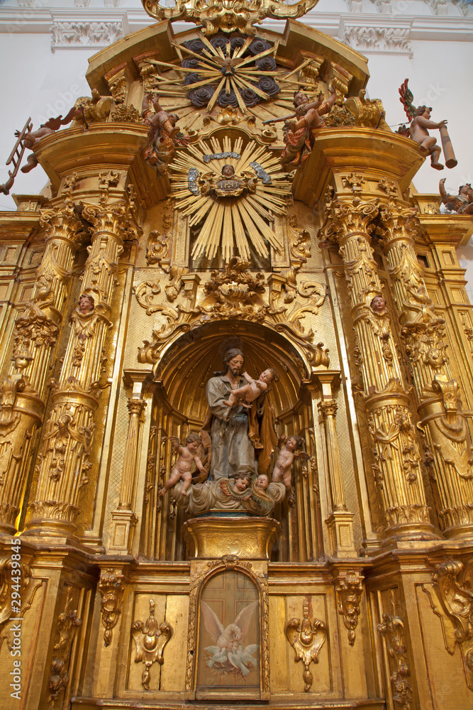 TOLEDO - MARCH 8: Baroque side altar of Saint Joseph from church Iglesia de san Idefonso on March 8, 2013 in Toledo, Spain.
