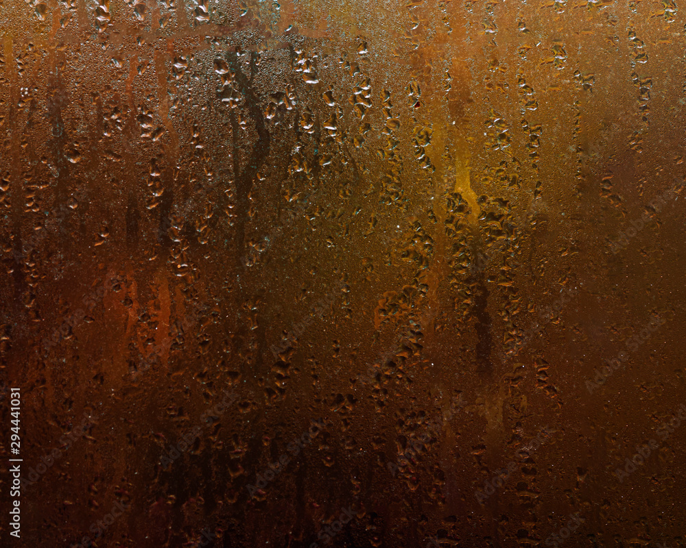 Wet window with drops of water. Autumn mood and fall concept Wet window with drops of water. Autumn mood and fall concept