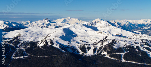 Whistler Mountain Ski Resort in British Columbia , Canada in the winter season with all the snow and mountains in the background