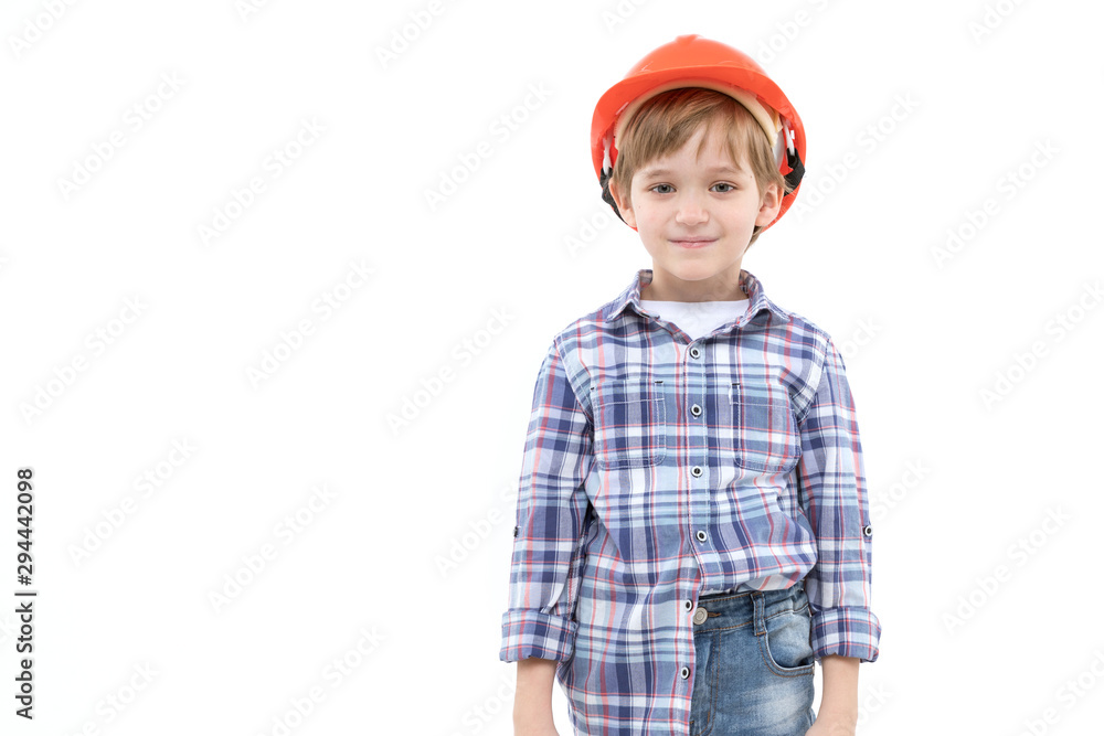 Adorable kid dressed as foreman in orange helmet and shirt Adorable kid dressed as foreman in orange helmet and shirt
