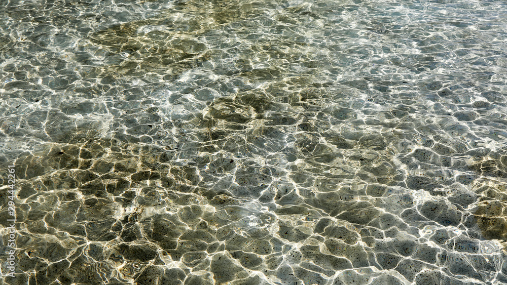 Obraz premium Water reflecting in a shallow pool