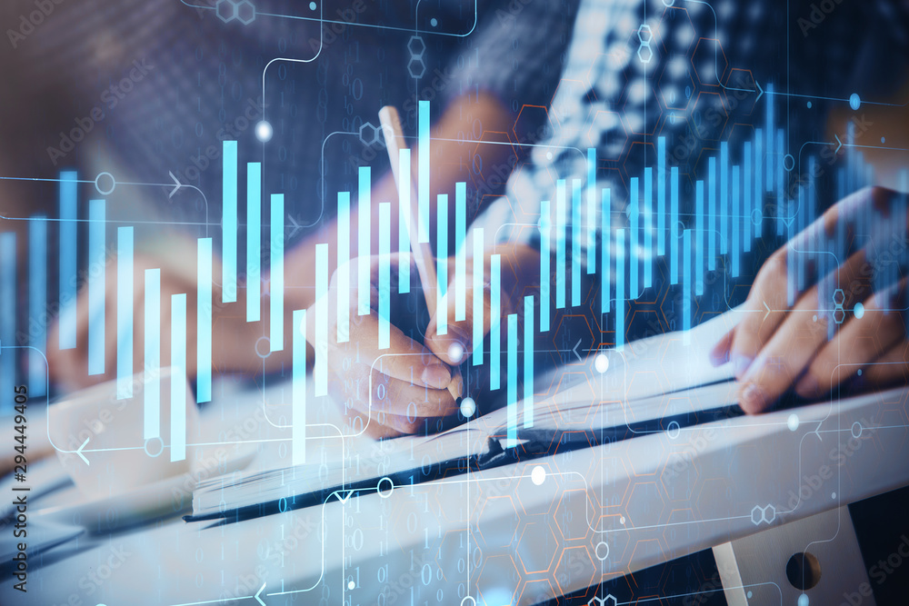 Multi exposure of two men planing investment with stock market forex chart. Multi exposure of two men planing investment with stock market forex chart.
