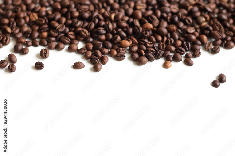 Graceful scattering of coffee on a white background with a place for copy-paste. Graceful scattering of coffee on a white background with a place for copy-paste.