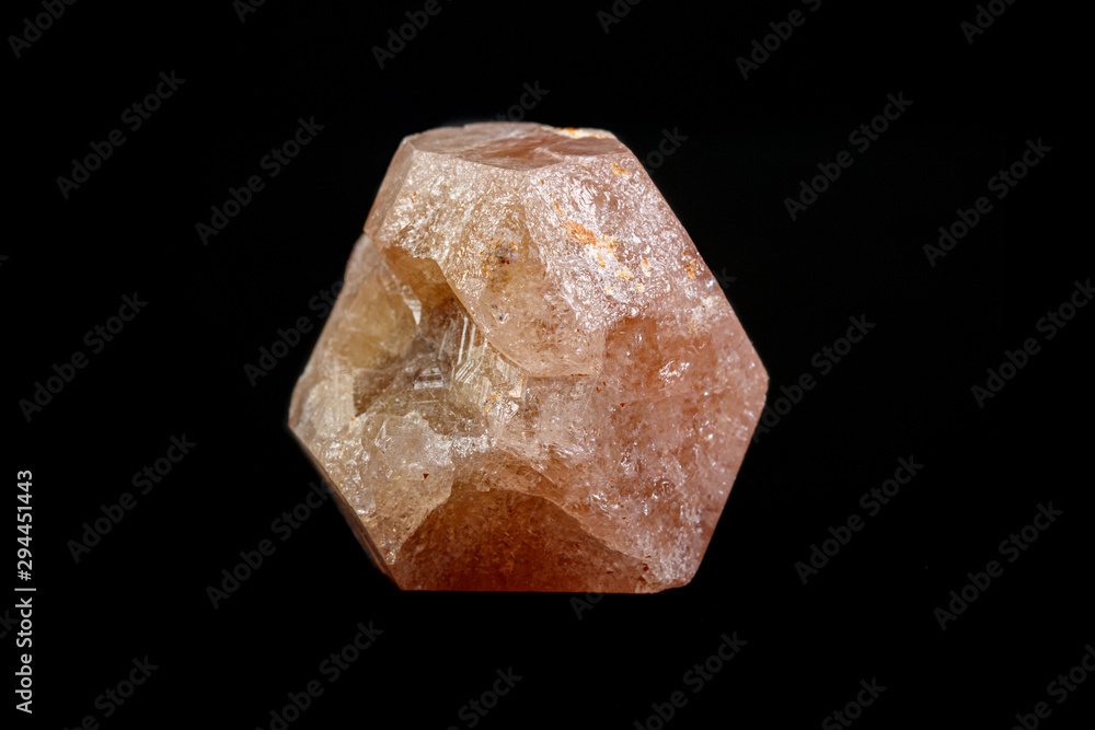 macro mineral garnet stone on a black background macro mineral garnet stone on a black background