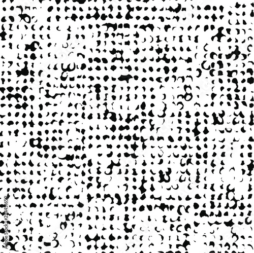 Small uneven spots and particles of debris. Abstract vector texture. Distressed uneven background. Grunge texture overlay with fine grains isolated on white background. Vector illustration. EPS10.
