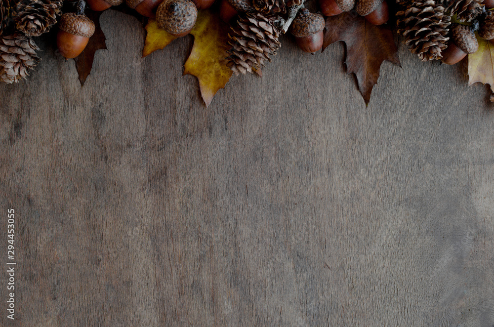 Great autumn coposition for large space for text or another design on brown wooden surface. - obrazy, fototapety, plakaty 