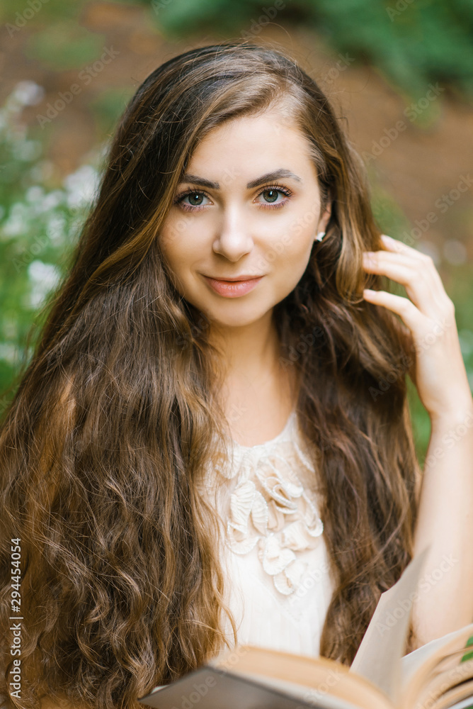 Portrait of a Slavic girl with blond long wavy hair Portrait of a Slavic girl with blond long wavy hair