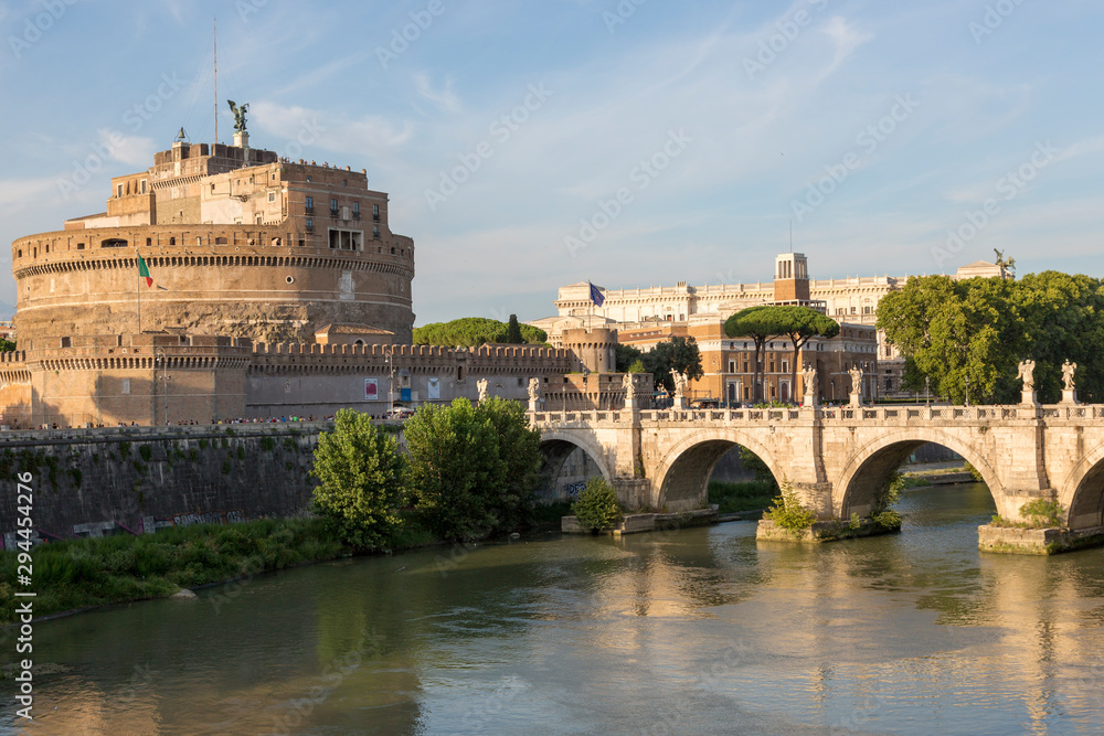Castle of the Holy Angel and the bridge - architectural monuments on the banks of the Tiber in the center of Rome