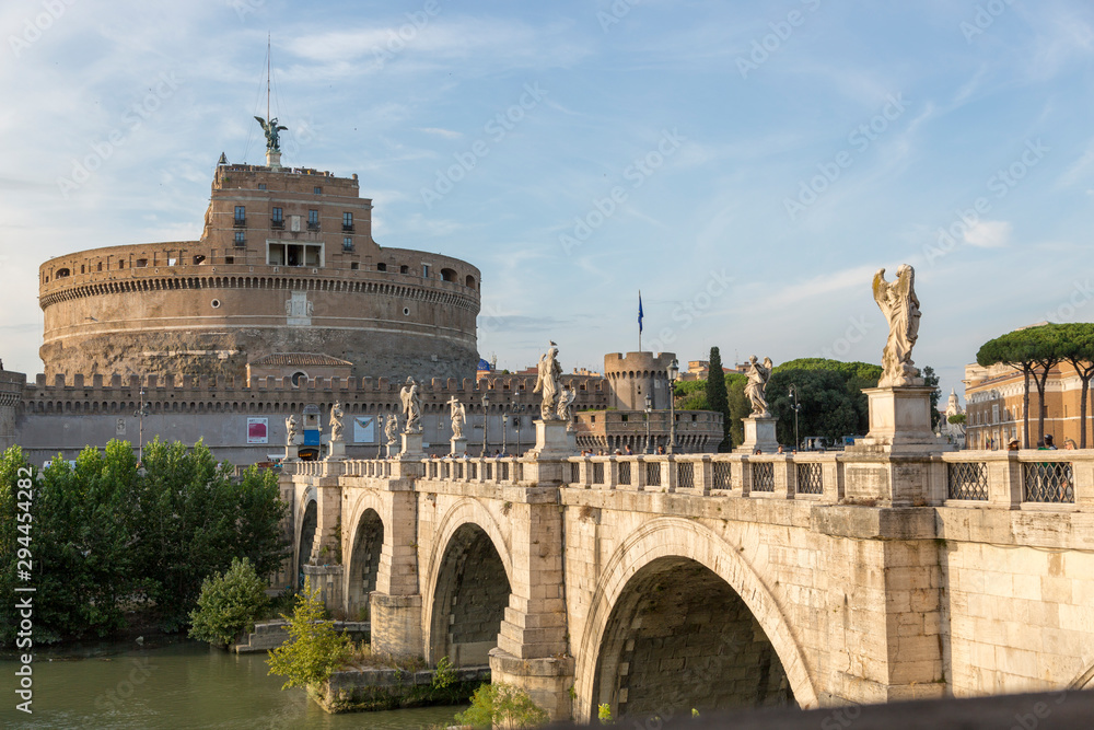 Castle of the Holy Angel and the bridge - architectural monuments on the banks of the Tiber in the center of Rome