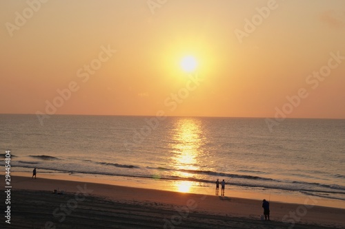 Fishing in the surf of the Atlantic Ocean at Sunrise.