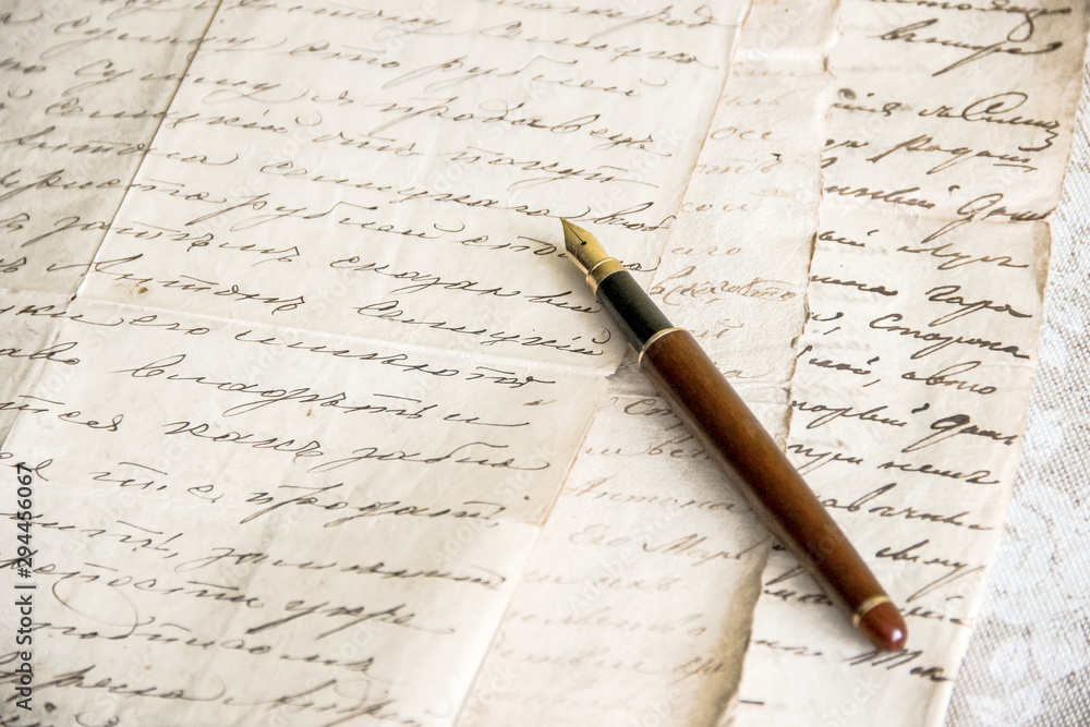 fountain pen lies on manuscript from old paper fountain pen lies on manuscript from old paper