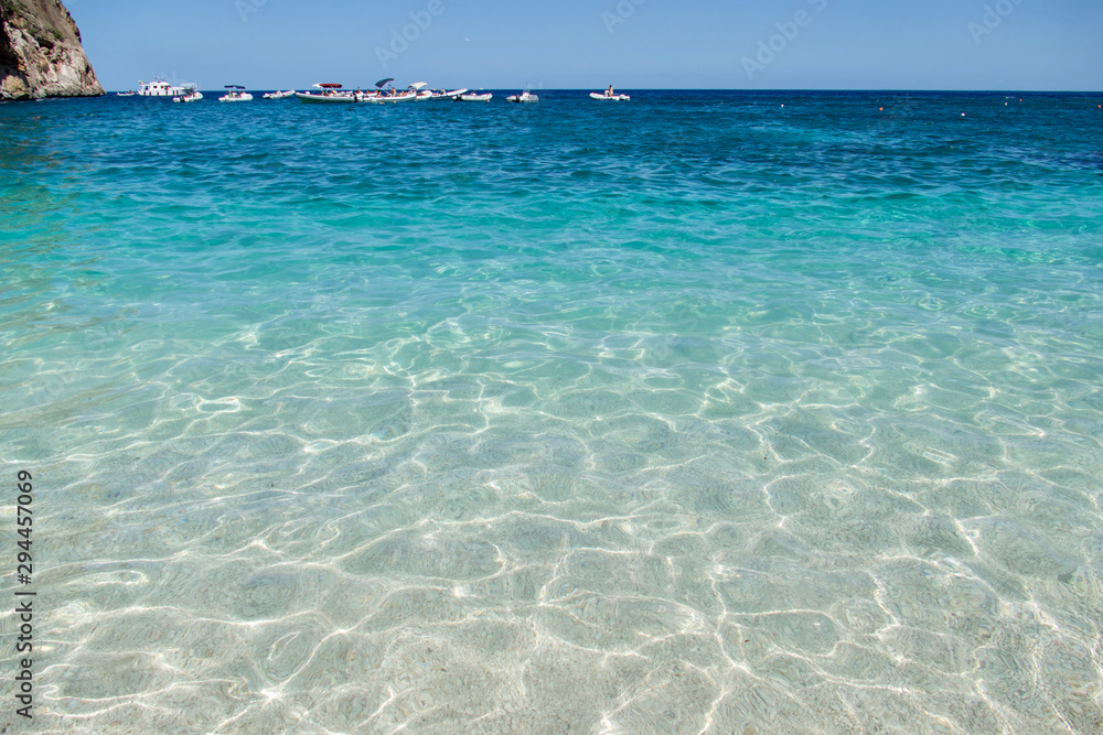 Beach in Cala Gonone in The Emerald Coast, Orosei Gulf, Sardinia, Italy Beach in Cala Gonone in The Emerald Coast, Orosei Gulf, Sardinia, Italy