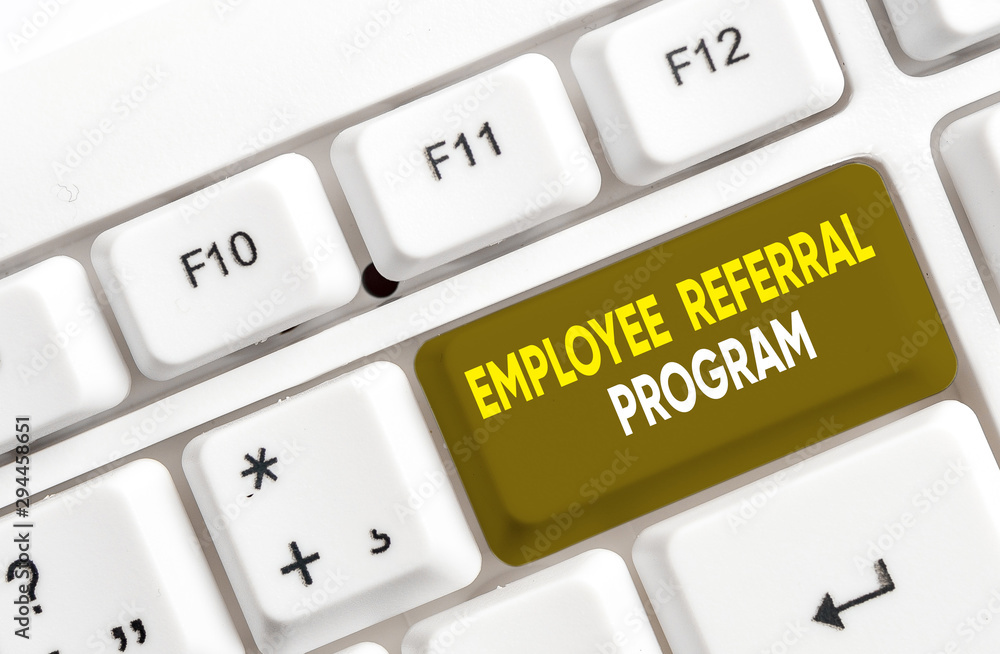 Writing note showing Employee Referral Program. Business concept for employees recommend qualified friends relatives White pc keyboard with note paper above the white background Writing note showing Employee Referral Program. Business concept for employees recommend qualified friends relatives White pc keyboard with note paper above the white background