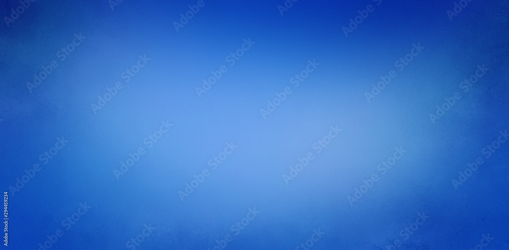 Dark and light blue background with soft blurred texture design, abstract blurry blue background with light center and dark borders Dark and light blue background with soft blurred texture design, abstract blurry blue background with light center and dark borders