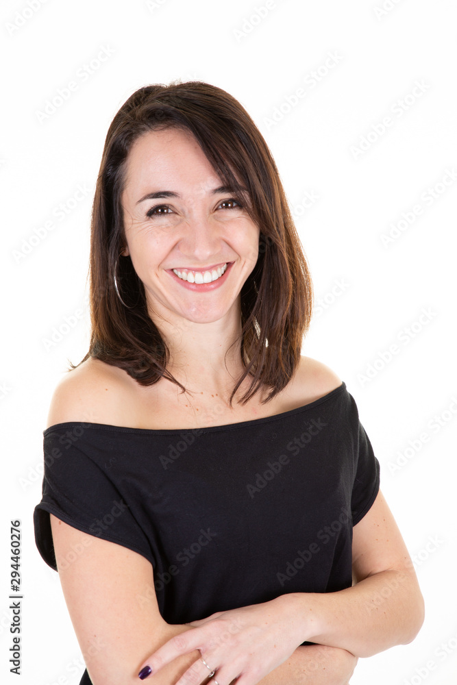 Laughing woman smiling with crossed arms looking at the camera Laughing woman smiling with crossed arms looking at the camera