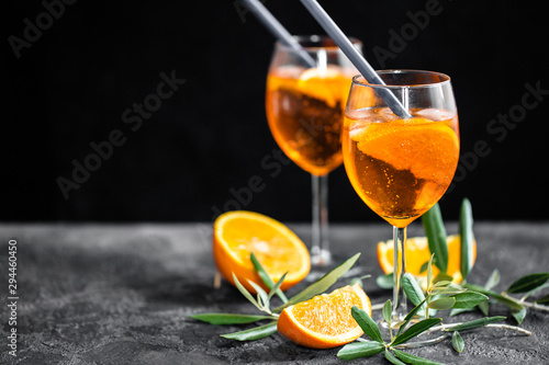 Fotografija Italian aperitif - aperol spritz with oranges