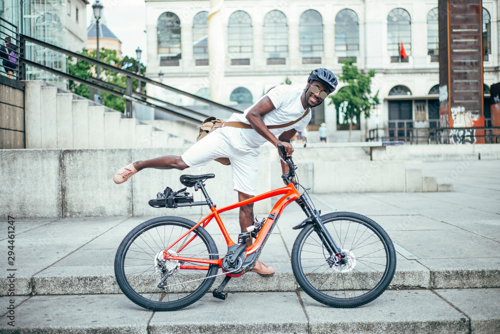 Bicycle courier getting on his bike Bicycle courier getting on his bike