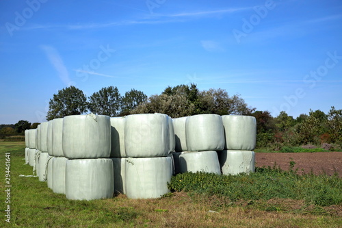 Runballs, hay bales wrapped in foil and stacked on top of each other for storage