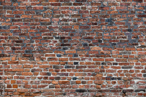 Old Red Brick Wall with Lots of Texture and Color.