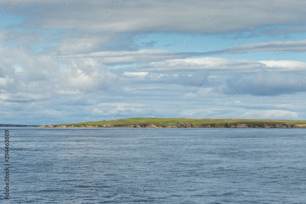 Orkney Islands coastline during a summer day, Scotland.